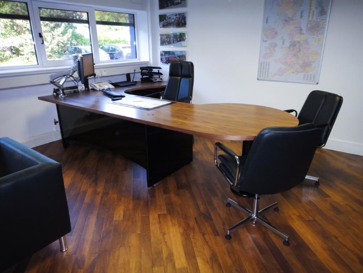 private office with desk and two chairs