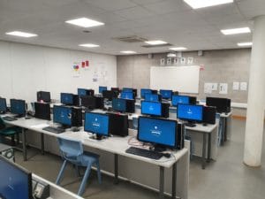 Parker computer room with desks and chair