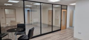Energy bolting glass partition
