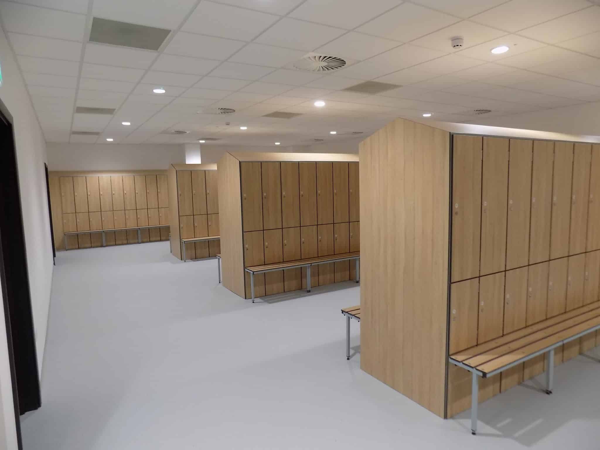 Bespoke lockers to including sloping tops and fixed credenza benchs