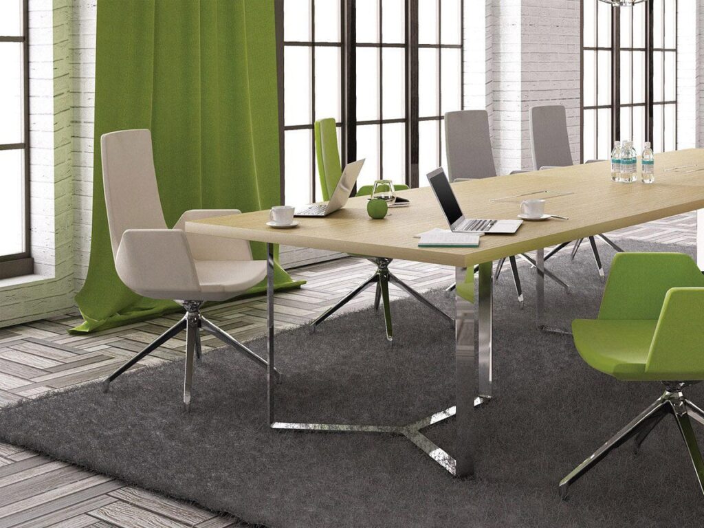 Green meeting table from office furniture installation companies UK